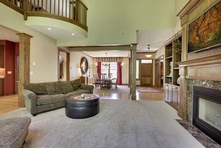 This space is open to the Entry, Dining Room and Kitchen, lots of natural light and detailing.