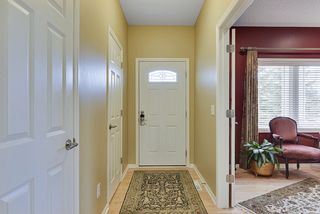 Welcome home... Convenient powder room and coat closet as you enter