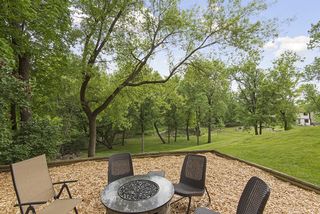 This area could be used for a playset or a firepit area as shown