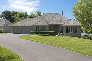 Welcome to 7280 Kurvers Point Road on Lotus Lake!