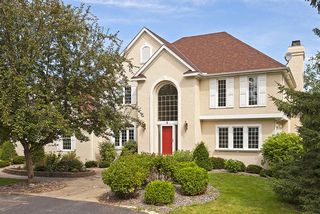 Newly finished stucco exterior, side drive garage with 4 car tuck under and separate drive entrance.
