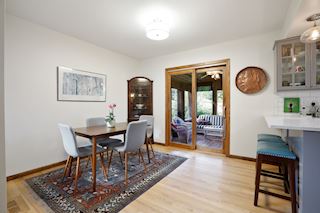 ...and the sliding glass doors lead you to the wonderful screened porch