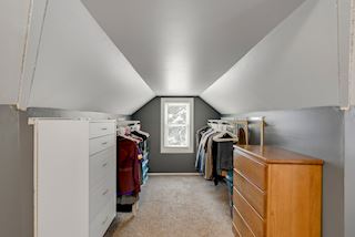 Huge closet space with another closet across the bedroom