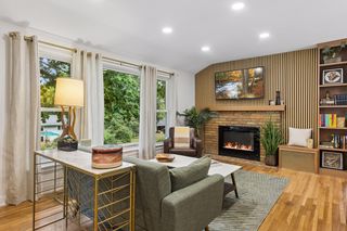 large Sochacki Park facing living room windows bring light in to your newly refreshed and updated home