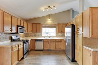 Wide open kitchen with updated appliances