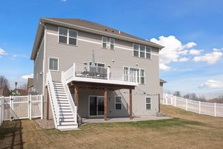 Fenced-in backyard, deck and stamped concrete patio