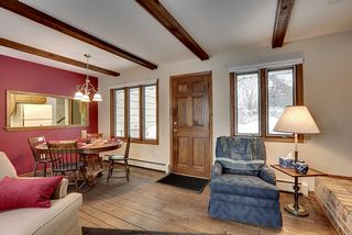 Family room overlooks deck waiting for snow to melt and entertain the first barbeque