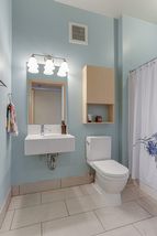 The full bathroom boasts a large deep soaking tub!