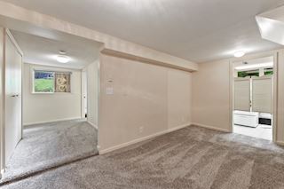 Lots of storage spaces. Swinging doors open to the laundry room. Note: wood covered window has been replaced. replaced week of July 29th.