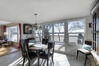 Formal dining looking out over the lake