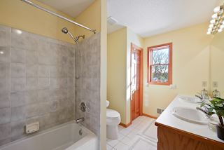 Upper level full bath with dual sinks