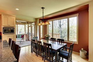 Visitors easily move from kitchen to screen porch to deck