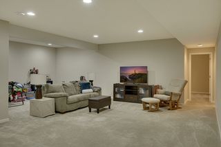 currently setup as a lower level family room/kids play area