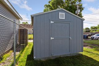 Newer shed in backyard