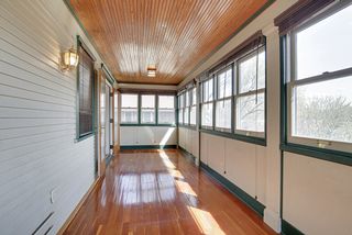 The 2nd Floor Back Sunroom/Porch. Original Wood Floors & Bead Board Ceiling too! 