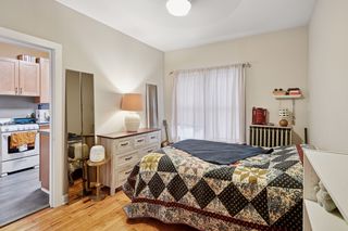 View of Bedroom in Apt #2.
Features new vinyl windows and hardwood floors.