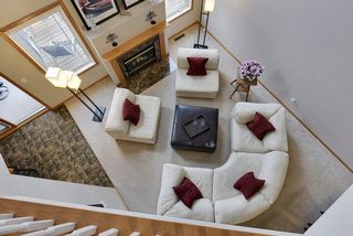 Entertain guests or relax with family near cozy fireplace...