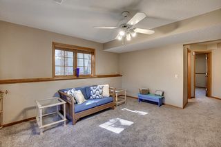 Hallway connects adjoining lower level bath. 