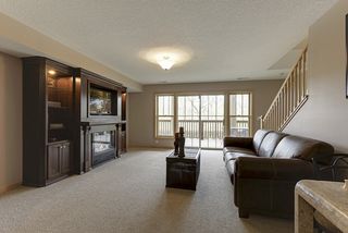 Built in, lighted, TV units with fireplace 