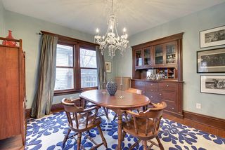 The Dining Room features Hardwood Floors, Original Built-In Buffet & Crystal Chandelier...