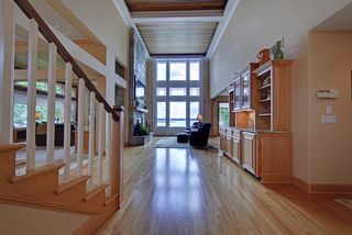 Large, 2 story great room, south facing, white oak flooring and cabinets. Cedar soffit lit ceiling.