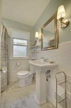 Updated main floor bath with tub and shower. 