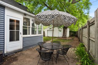 Cute little patio is ready for afternoon BBQs