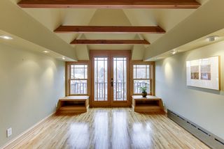 4349 Aldrich hallway leads to a meditation room/studio with a balcony overlooking the back yard and gardens