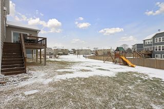 Spacious back yard will accommodate play equipment or garden, if desired!