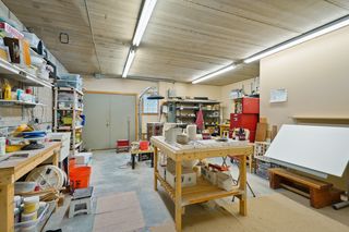 HUGE workshop with access to the yard.  Workbenches stay with the house.