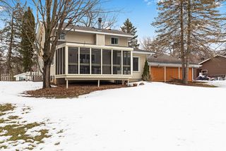 Relax on this spacious screen porch overlooking wonderful backyard...