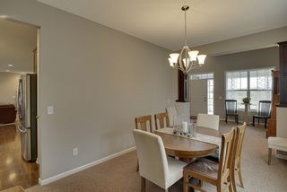 formal dining room connecting to the kitchen, front flex room, and office