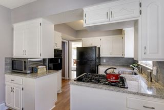 Kitchen with fresh enameled cabinets and granite counter tops