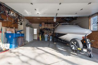 Garage attached to the house has walk door in front and in back