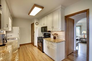Newer cabinets with gorgeous granite countertops.
