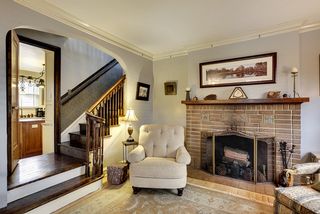 You will find a BEAUTIFUL Wood Burning Fireplace in the Living Room...