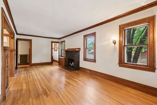 Very spacious Living Room has beautiful wood floors!
