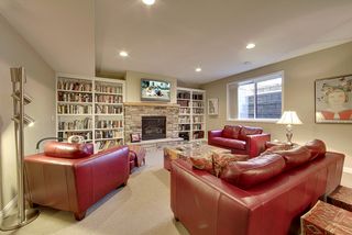 The family room features a gas fireplace with stone surround and mantle.