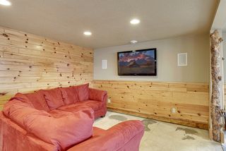 A TV gathering area is just off the Wet bar and Game room area.