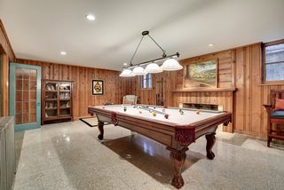 Lower Level Billiard Room with Wood Burning Fireplace and original Bamboo Tiki Bar...