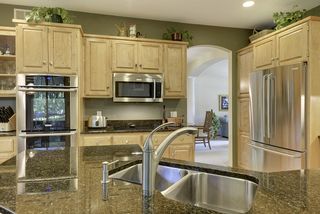 Well appointed kitchen with Stainless faucet and updated appliances