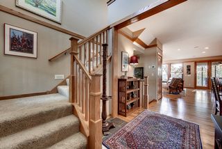 Entry area leading to the 2nd level; craftsmen style banding and lights over the Entry area complement this space.