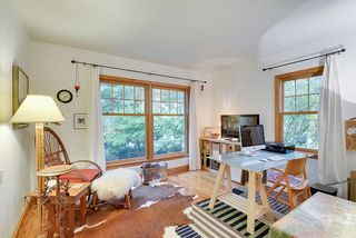 Main Floor Bedroom #3 is currently used as an Office/Craft/TV Room. You will LOVE the oversized Marvin Windows!  