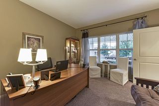 Main floor office with view out through the front covered porch