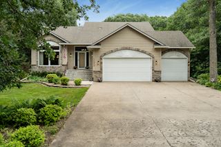 Long Concrete Driveway Brings You to the House that is Tucked Back into this 2.5 Acre Property