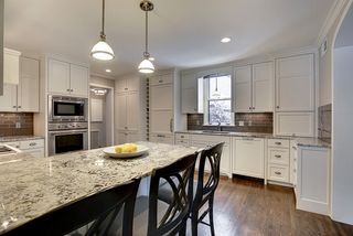 The Dream Gourmet Kitchen features Thermador Double Ovens and Thermador Gas Cook-Top...