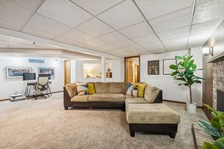 20. Open lower level with space for a bar and office