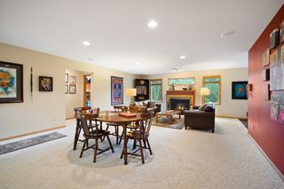 Walkout lower level with fireplace and room for a game table.