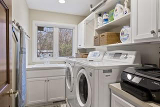 convenient upper level spacious laundry with ample cabinet space