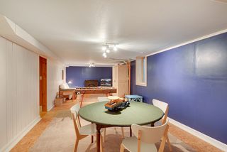 The Lower Level Family Room features a Wood Floor! 